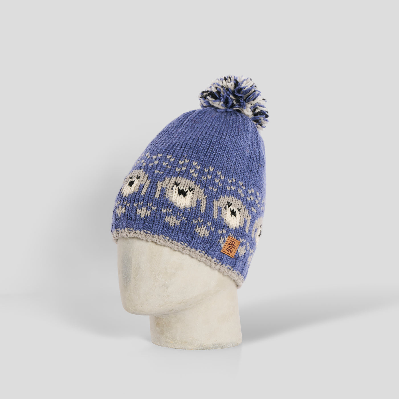 Cuffia cagnolini lana pom pom denim Pachamama